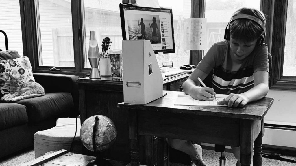 virtual school student working at home desk